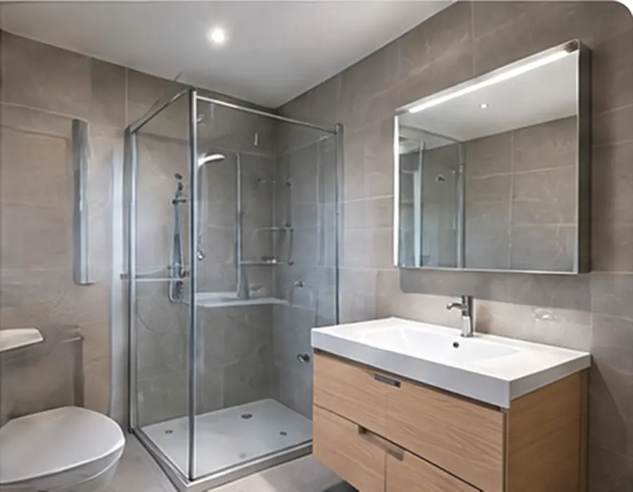 Modernisiertes Bad mit Dusche und
großformatigen Fliesen